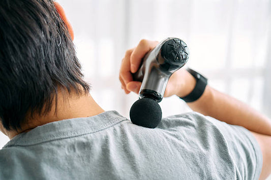 How to Use a Massage Gun (And What Each Head Actually Does)